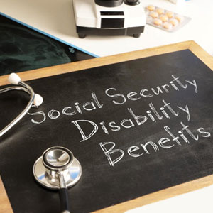 "Social Security Disability Benefits" written on a black board - Cardinal Law Partners