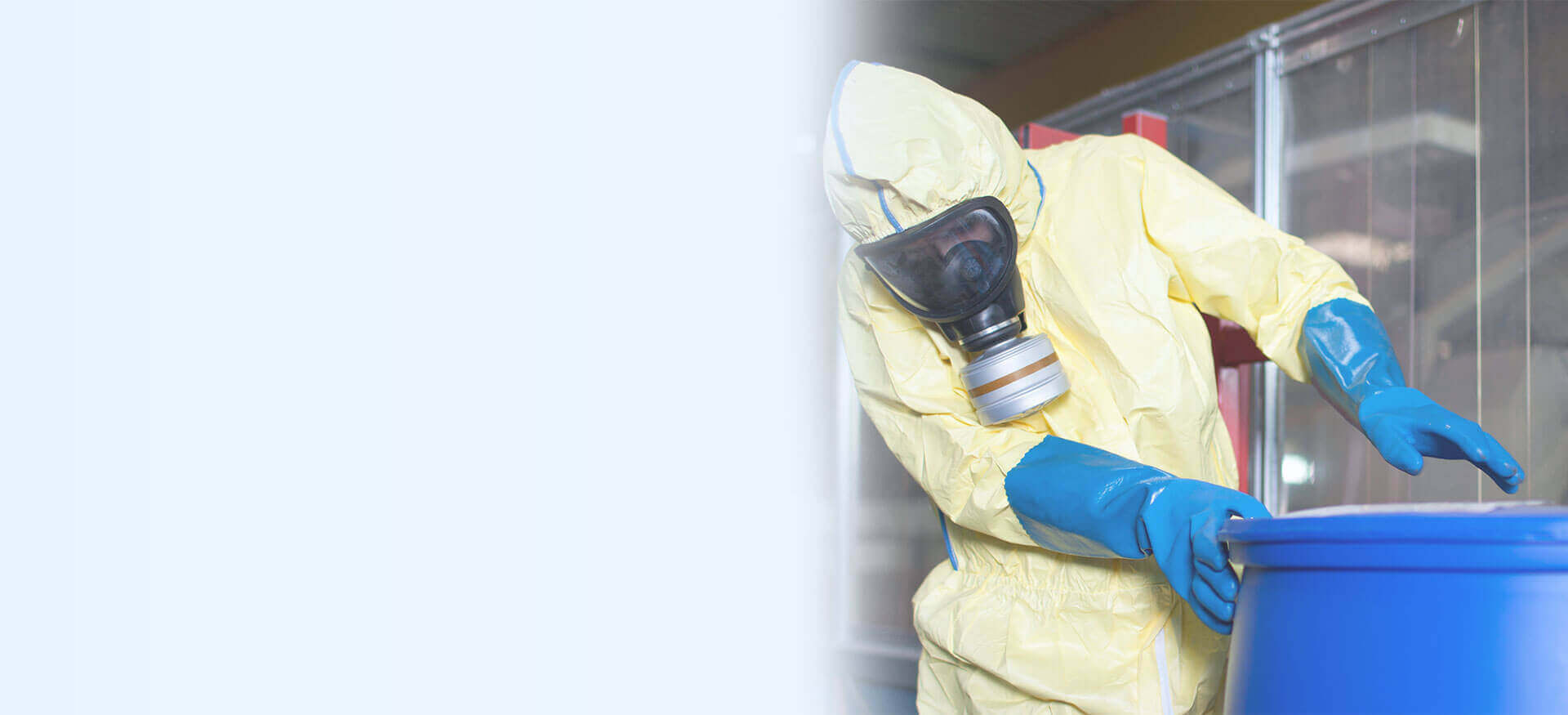 Worker in protective suits with toxic waste